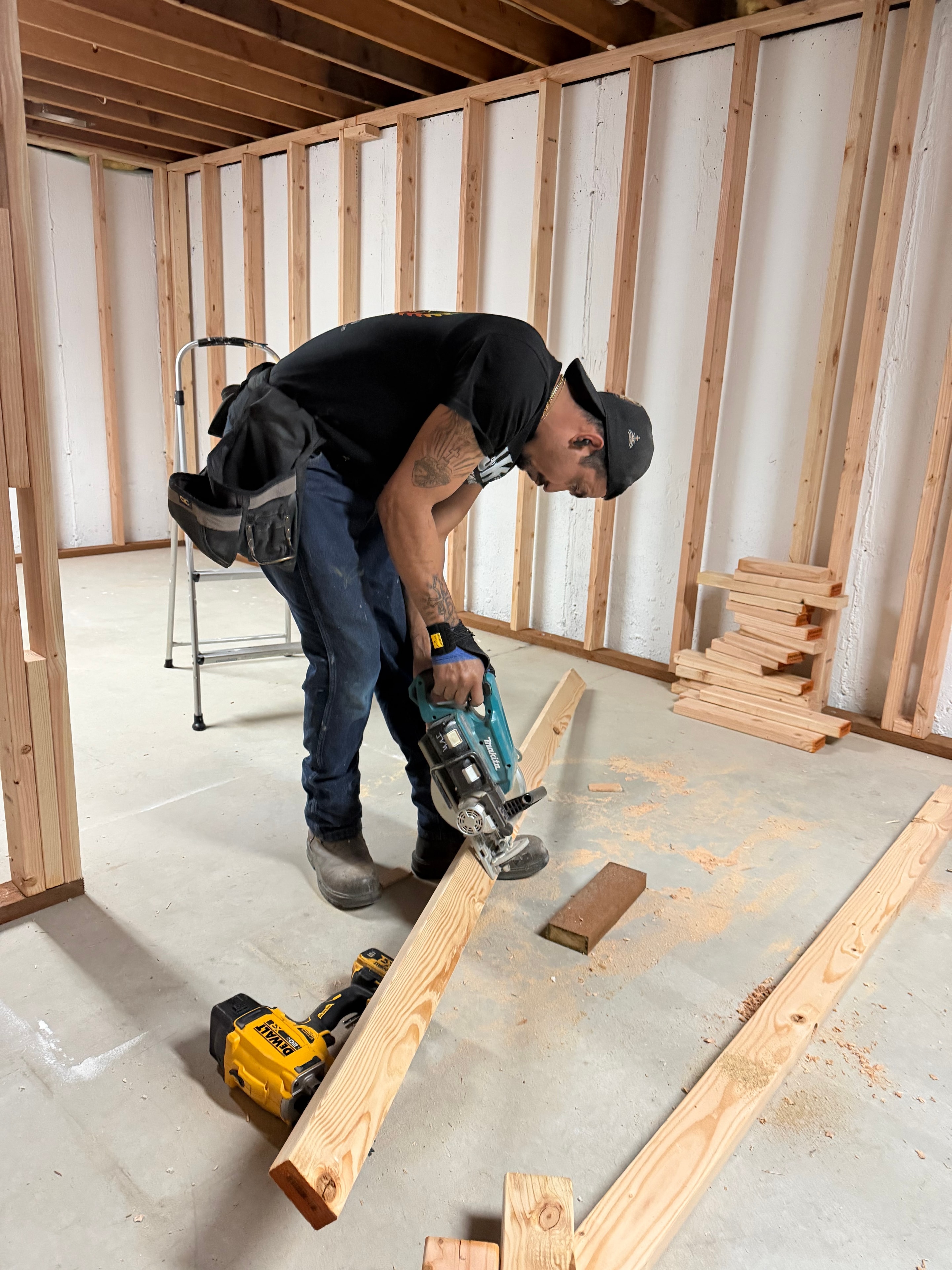 Finished basement remodel with clean drywall and flooring — JKV Contractors, Salt Lake County